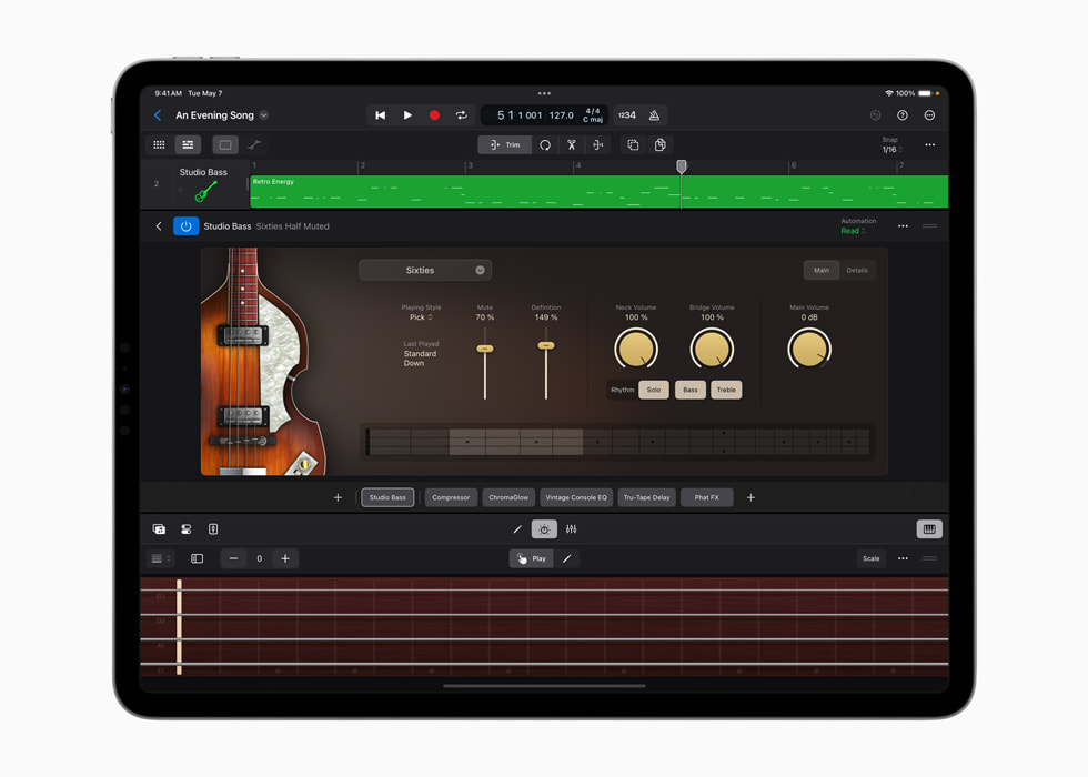 Apple Logic Pro Studio Bass interface on iPad, with an instrument panel, tone controls, and piano roll.